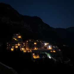 night view of a mountain village with few apartments